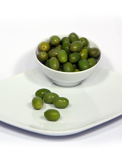 Sweetened green olives